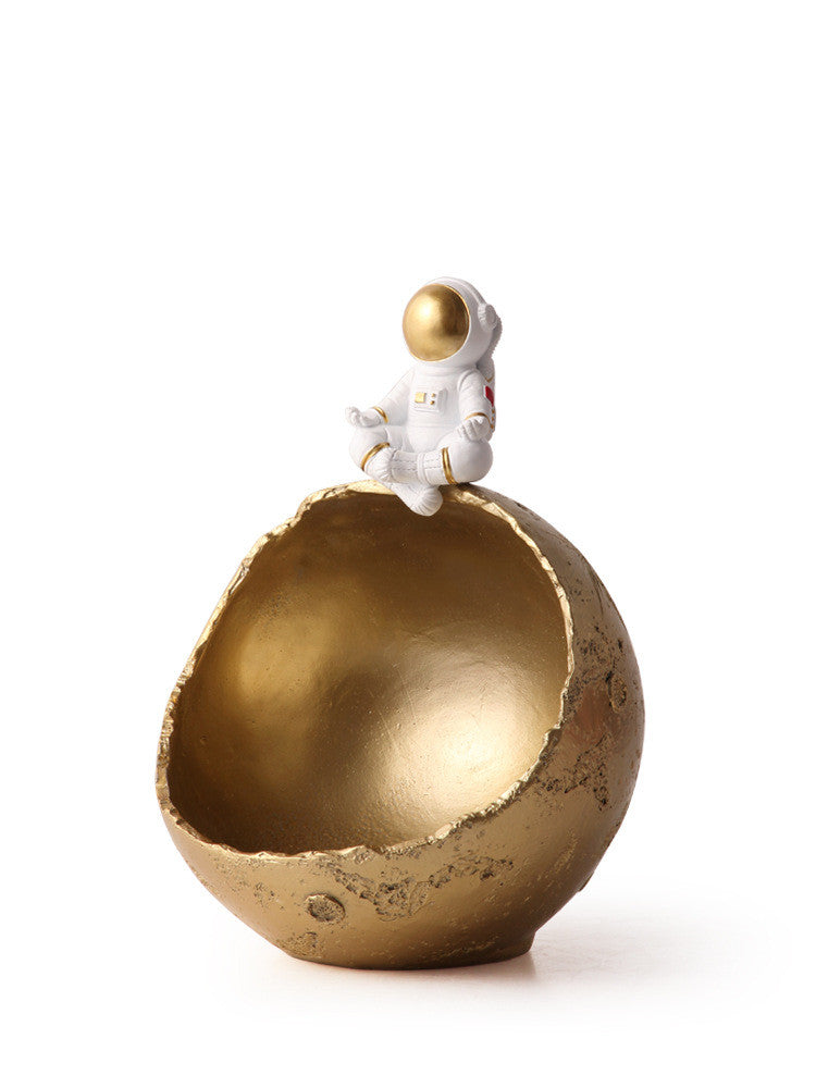 Astronaut key holder organizer in home entryway lifestyle photo